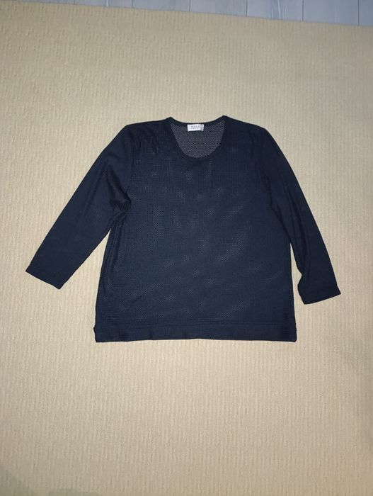 Жіноча кофта в сіточку