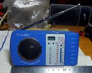 Радіоприймач карманний FM/AM з годинником.