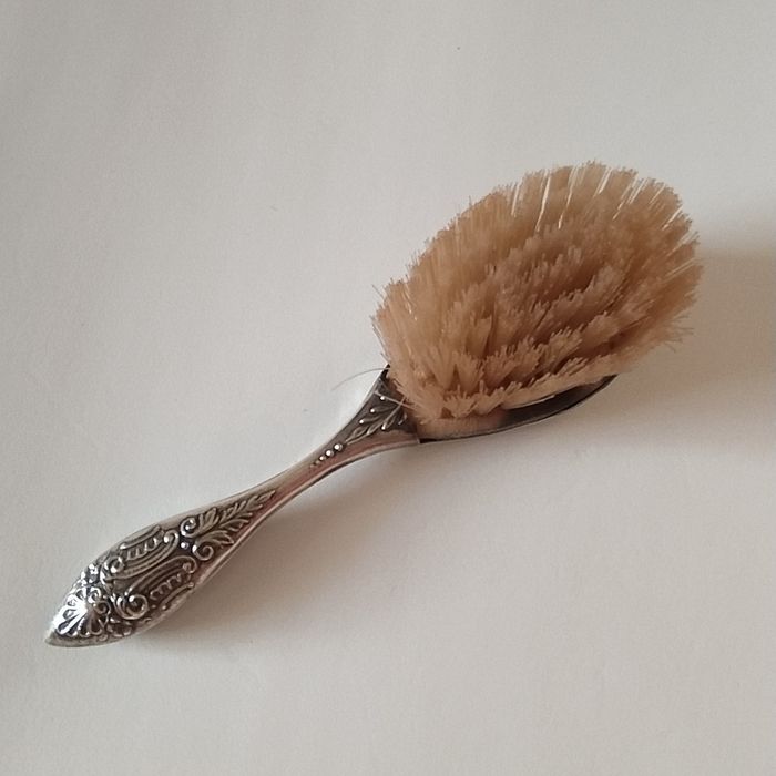 Antiga escova de cabelo em prata