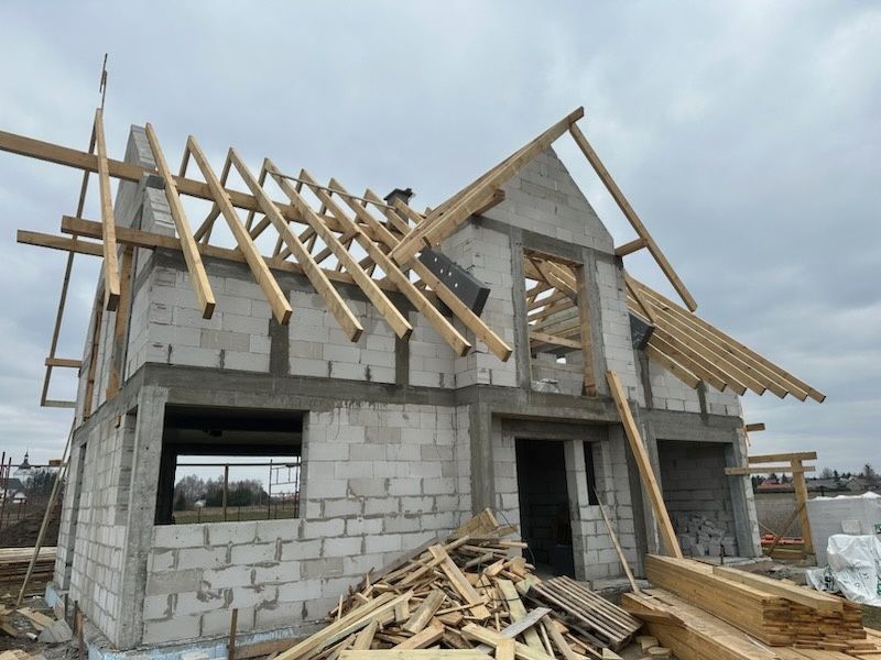 Budowa stanów surowych, ściany działowe, schody żelbetowe