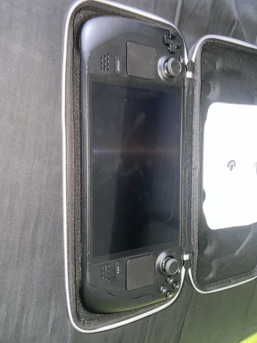 SteamDeck OLED 1T Semi Nova + Dock (menos de 100h de uso)