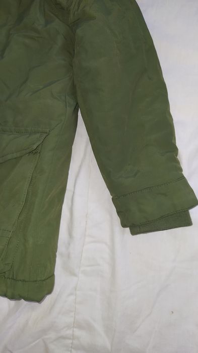 Зимова курточка для хлопчика зеленого кольору 123-128 6-7 років шапка