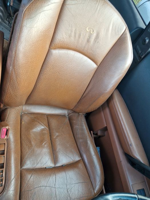 Srodek infiniti fx35 brązowy fotele kanapa boczki dywan