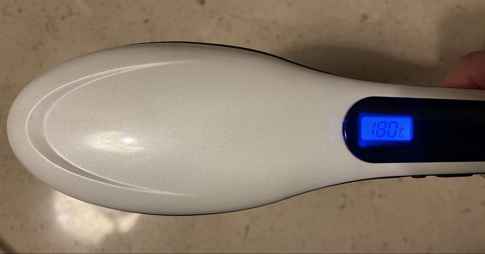 Escova de cabelo eletrica