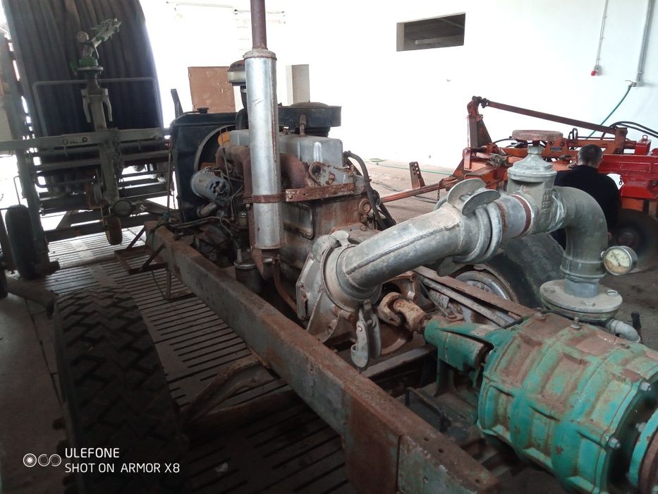 Rolo com canhão de rega e bomba de tirar água