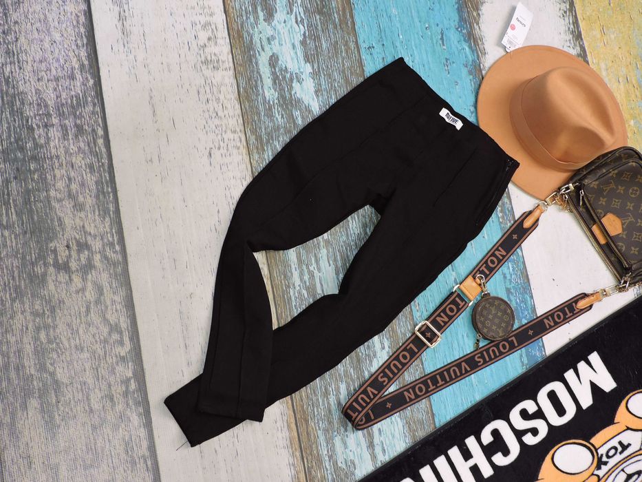 Native Czarne spodnie bryczesy kant S