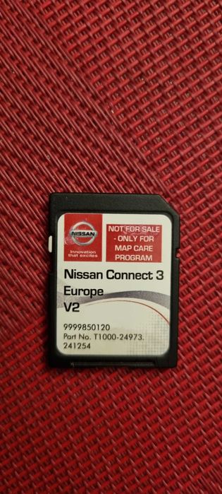 Nissan J11 radio/nawigacja, panel AC