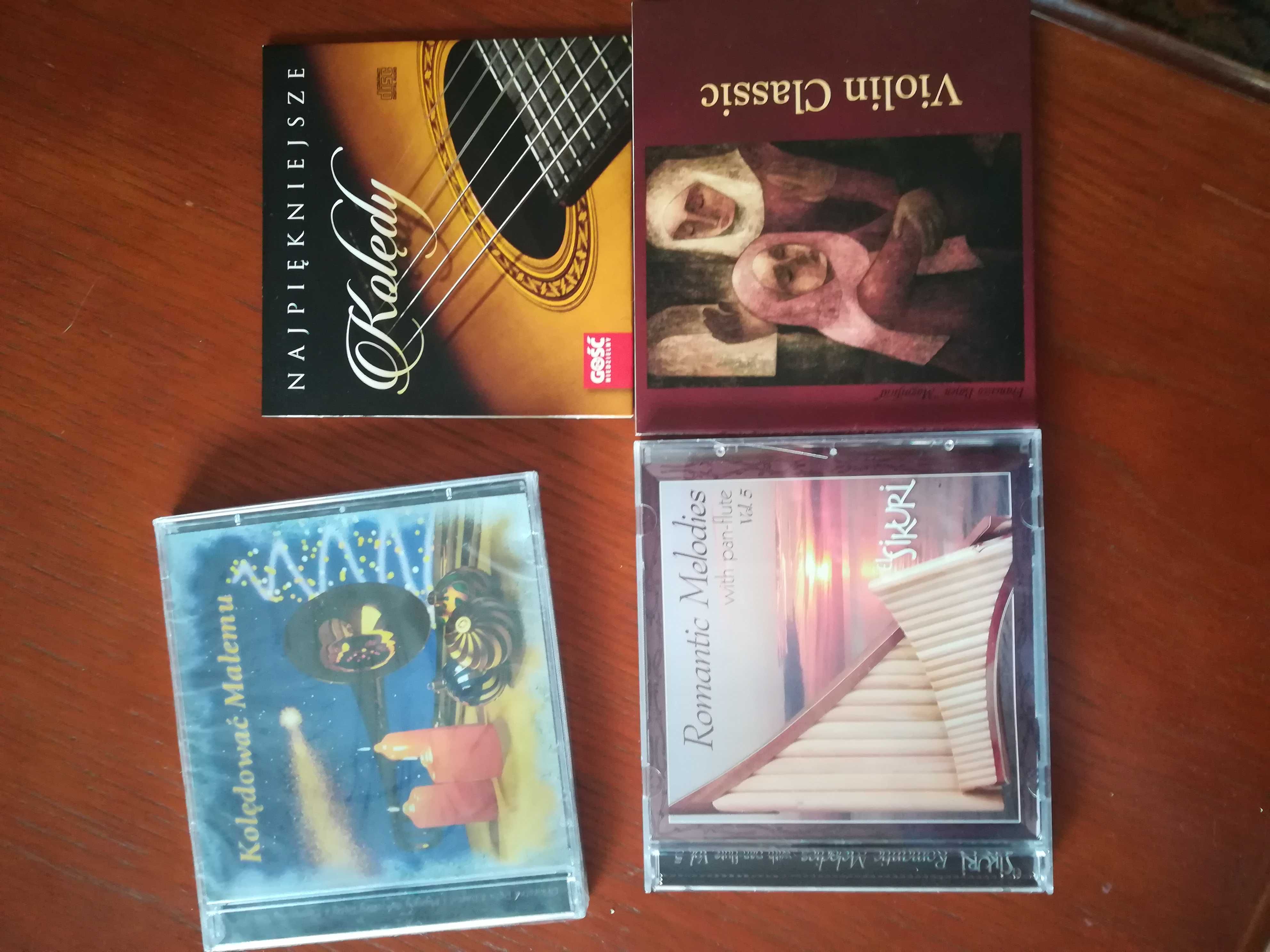 zestaw płyt CD (muzyka stolic) i DVD (Jan Paweł II)