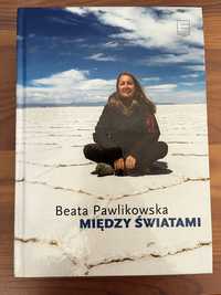 Między światami Beata Pawlikowska