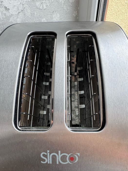 Тостер  sinbo є розморозка.