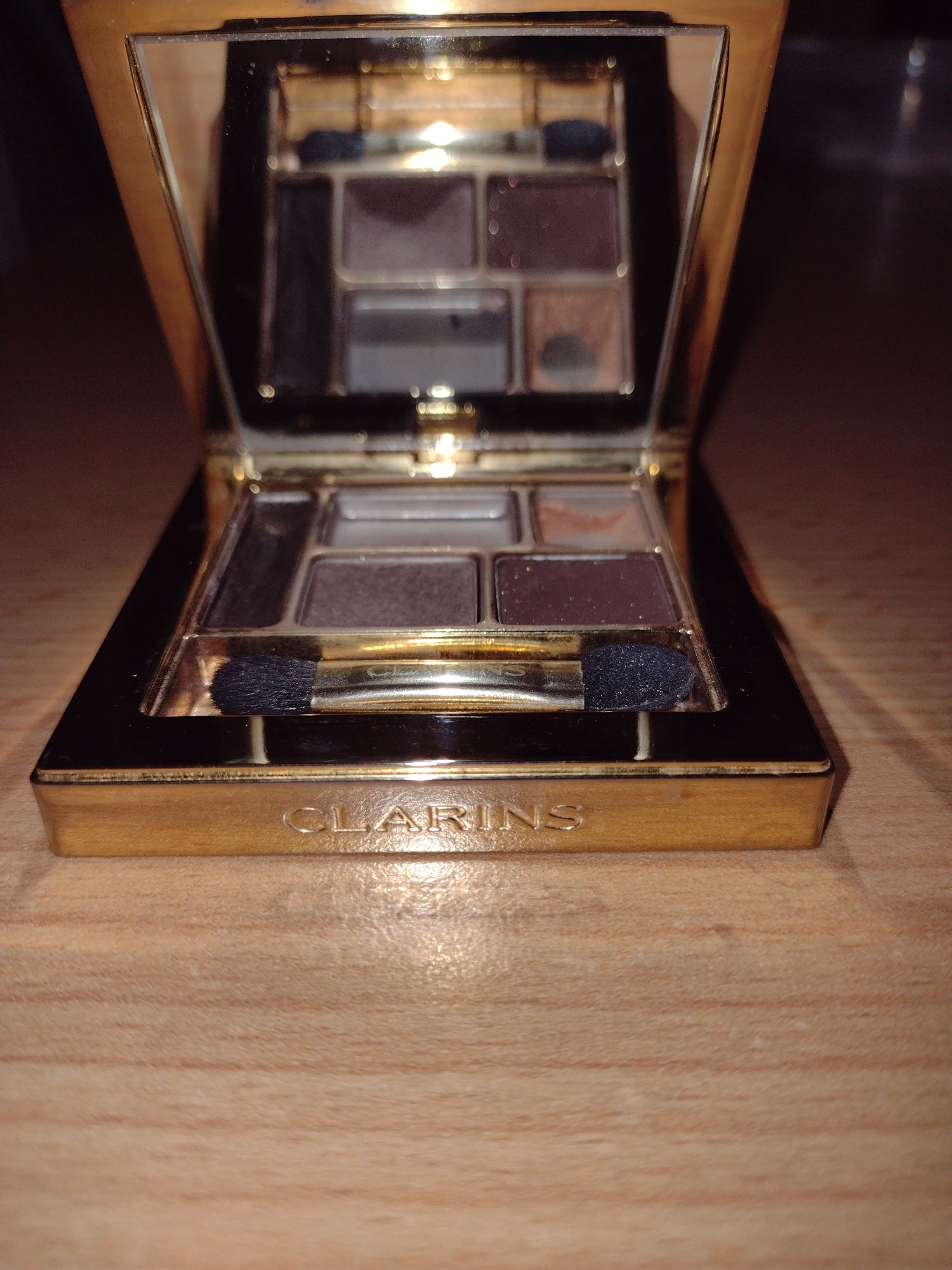 Paletka Clarins Gold Attraction, w stylu retro vintage