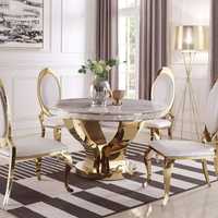 Złoty stół glamour Davson Gold okrągły blat o strukturze marmuru