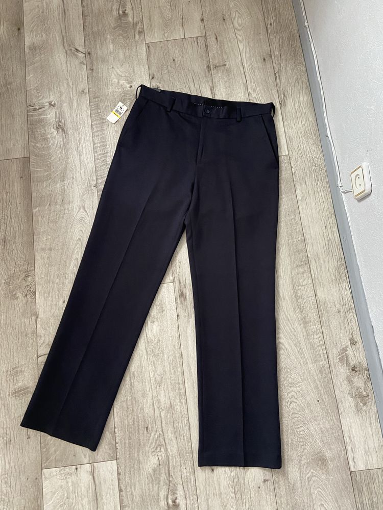 Нові люксові чоловічі брюки van heusen розмір w33 l32