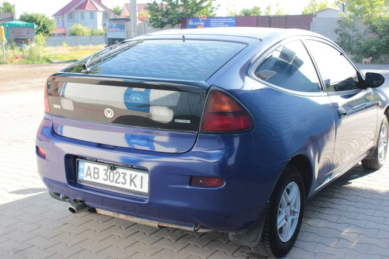 Мазда 323 f Mazda 323 BA f 1/3 газ бензин