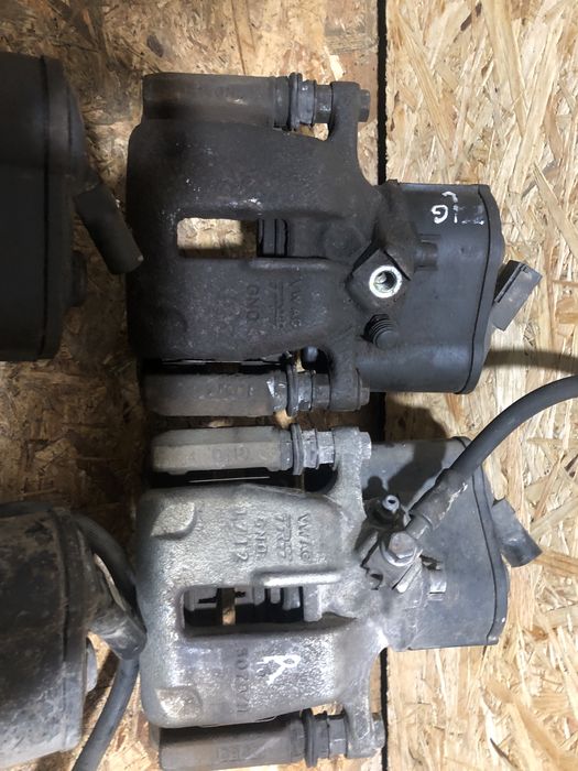 Супорт з моторчиком VW Passat B6 B7 CC Tiguan Golf 7