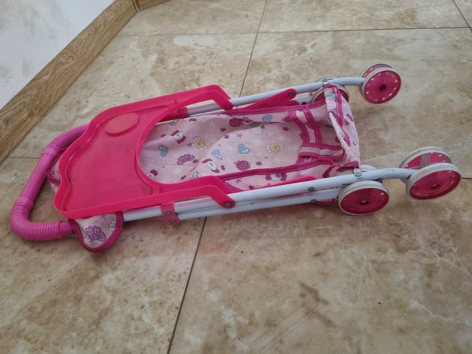 Іграшкова дитяча коляска для кукол