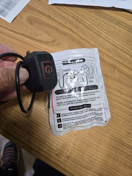 Кнопка включення додаткового освітлення для мотоцикла