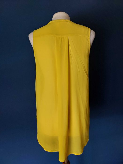 Top túnica amarelo com botões em madrepérola