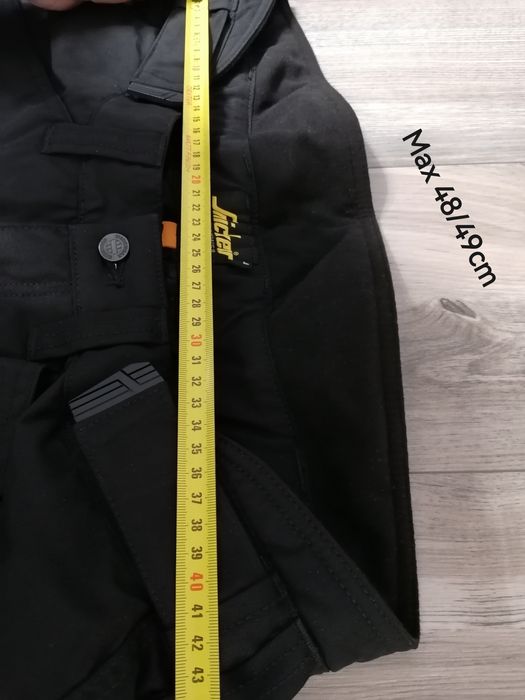 Nowe zimowe spodnie snickers workwear 6619 roz L mają wysoki stan