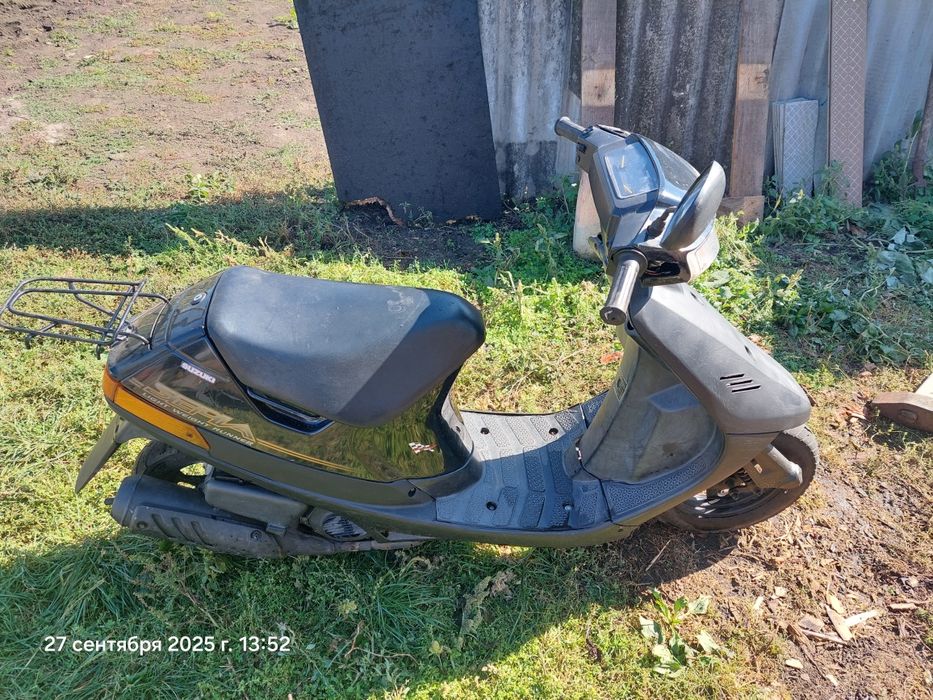 Продам скутер  suzuki