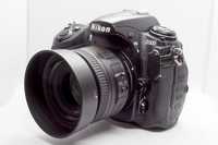 Nikon D300 + Lente Nikon DX 35mm 1.8G + Battery pack + flash + CFcards
