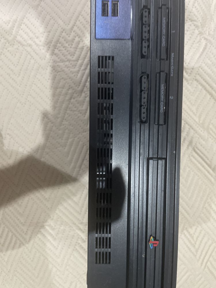 Vende se Ps2 usada + 2 comandos