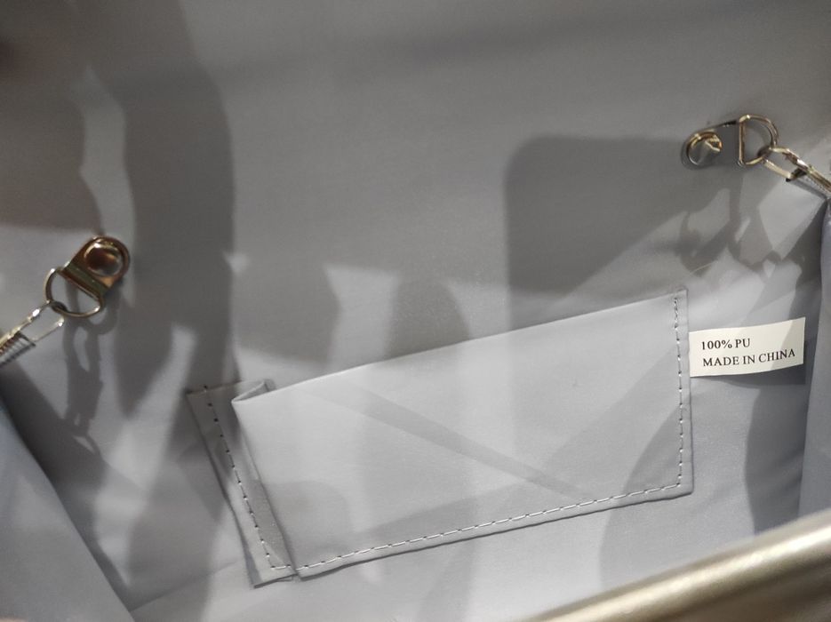 Srebrna torebka kopertówka na łańcuszku, prawie nieużywana