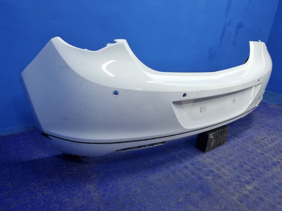ZDERZAK tylny OPEL Astra J tył 4 PDC Oryginał