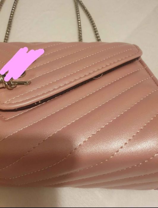 Mala tira colo rosa bebé