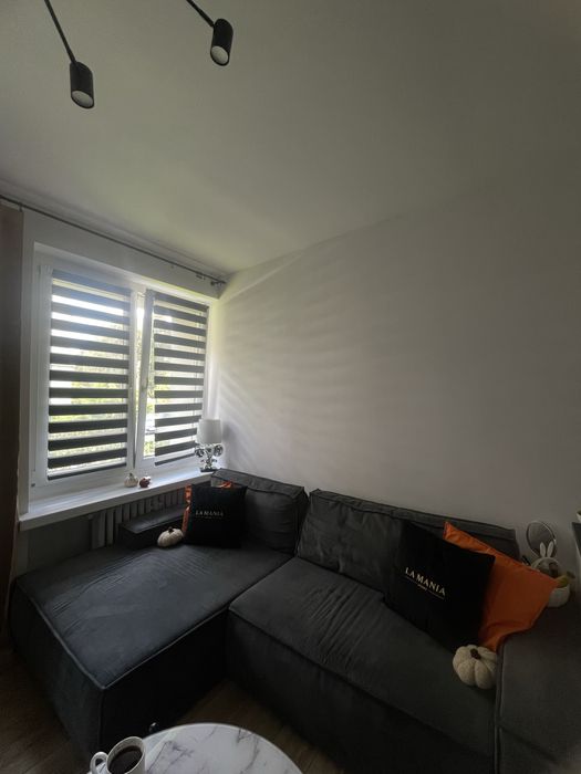 Narożnik w kolorze grafitowym Lectus z funkcja spania