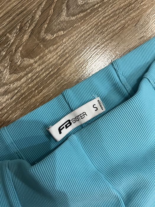 Бірюзові штани кльош