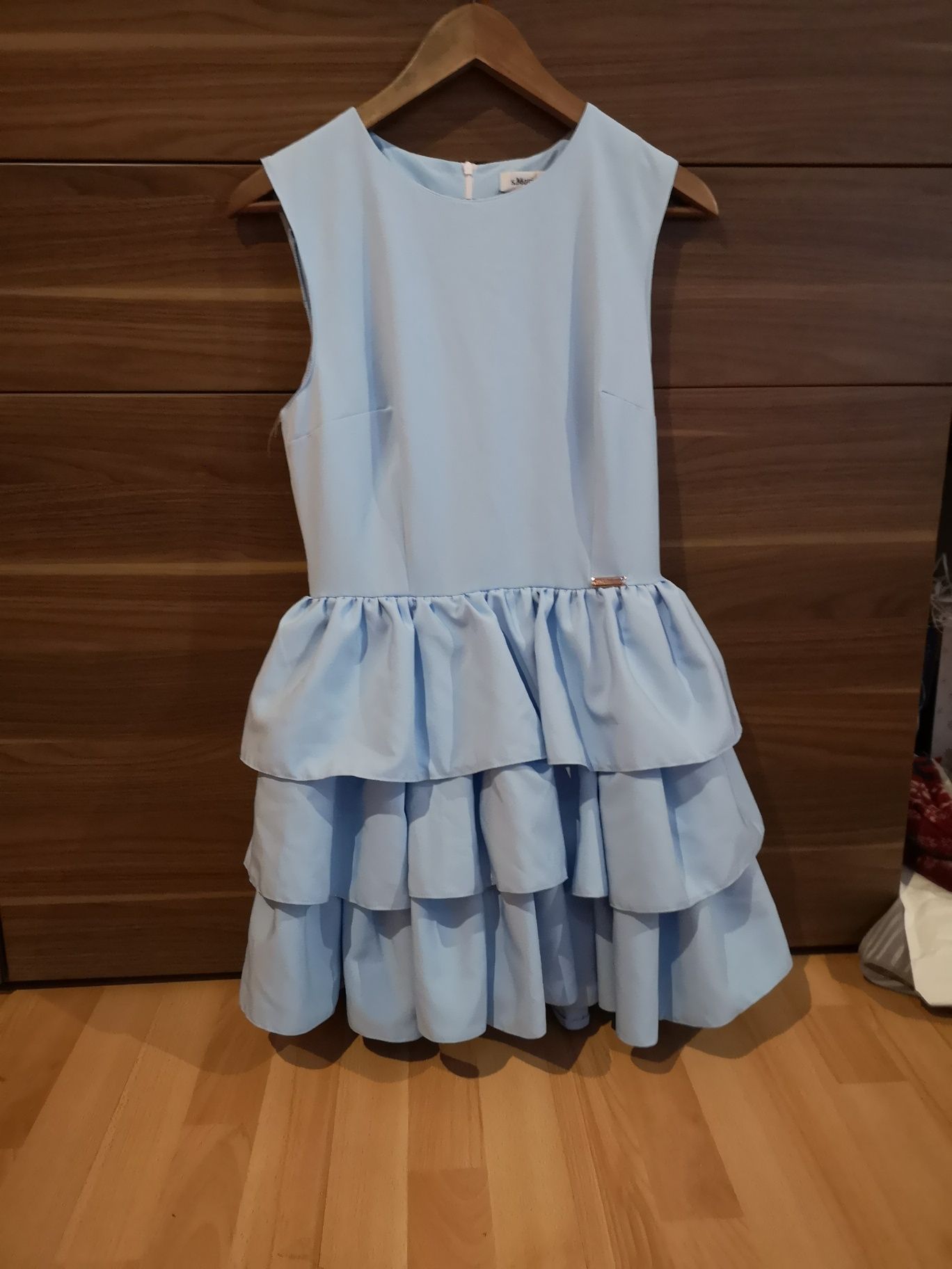 Błękitna sukienka s. Moriss