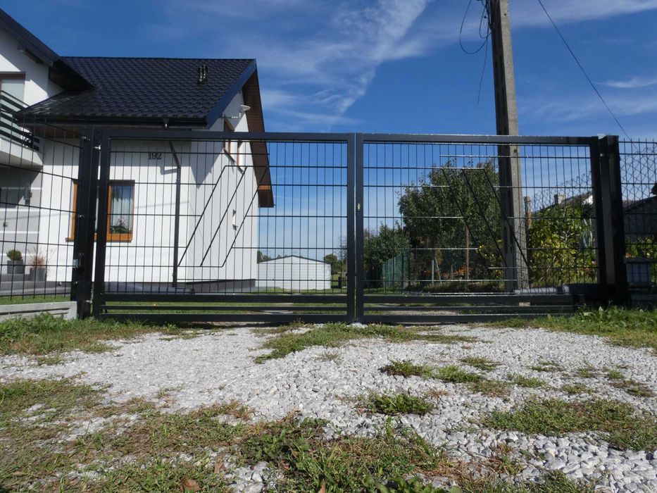 Brama ozdobna przesuwna dwuskrzydłowa wjazdowa