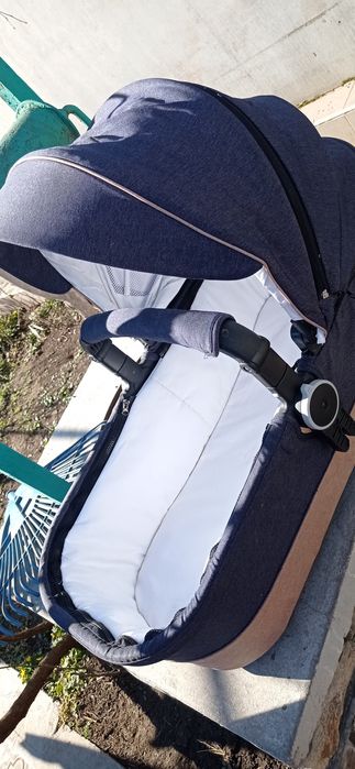 Люлька от коляски в идеальном состоянии, ручка снимается.