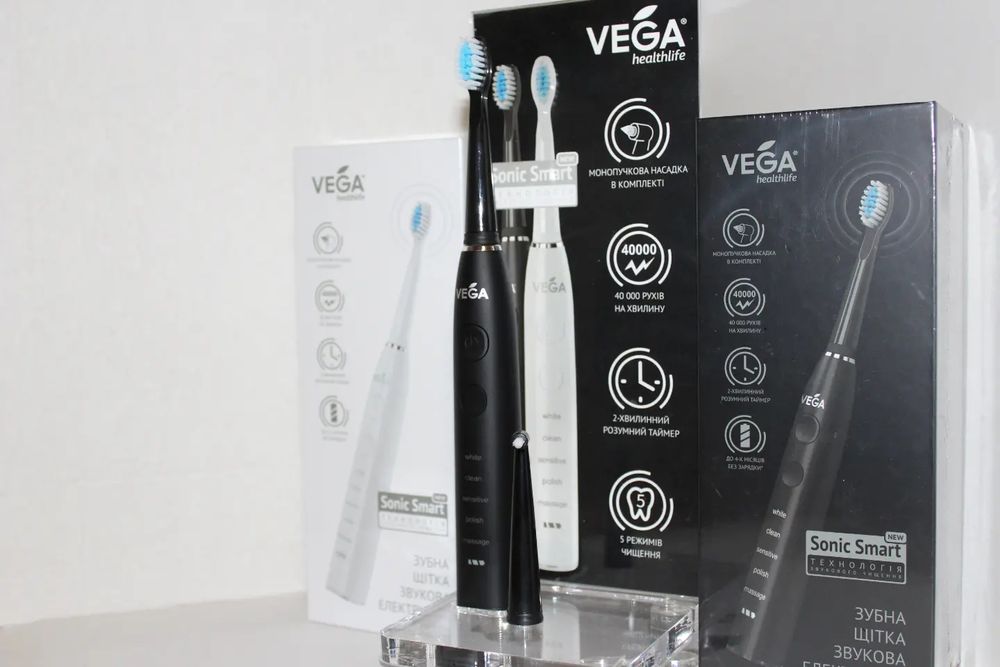 Зубна щітка електрична Vega VT-600 біла  та сорнаг