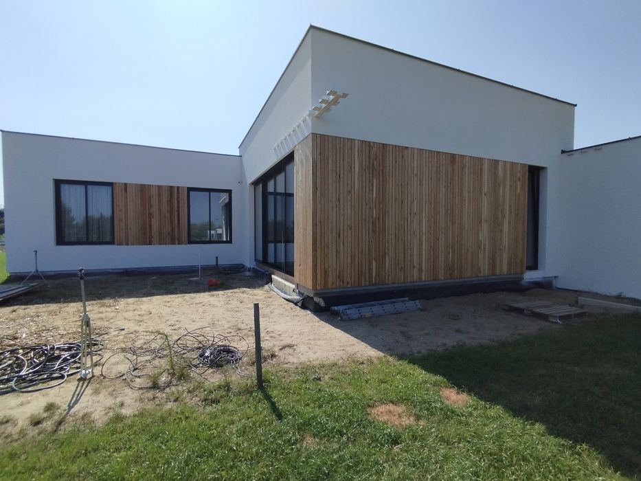 Elewacje docieplenia tynki podbitki dachowe