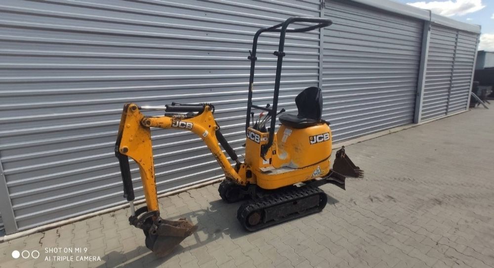 Wynajem minikoparki wozidło miniładowarka usługi wiertnica młot do kuc