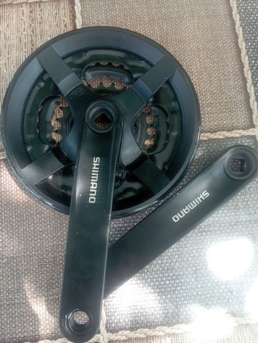 Шатуни Shimano Tourney, зірки Deore XT