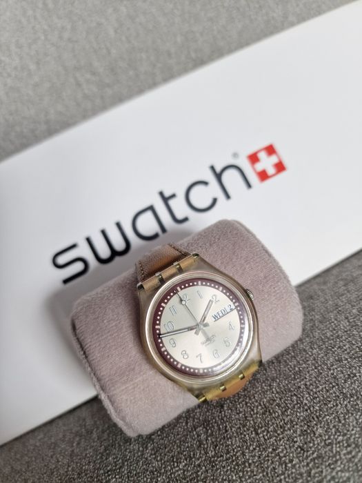 Zegarek szwajcarski Swatch Swiss z datownikiem i skórzanym paskiem