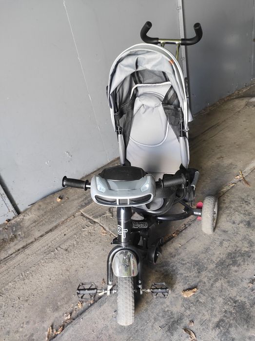 Детский велосипед с козырьком и родительской ручкой