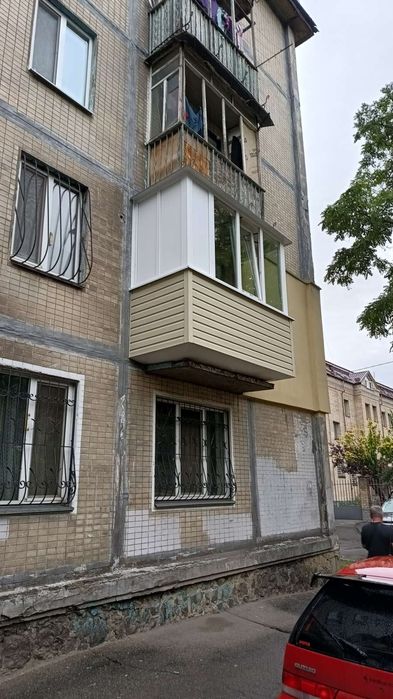 Балкони лоджії вікна двері