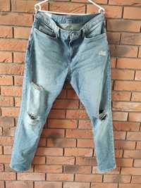 Spodnie jeansowe z dziurami slim (H&M)