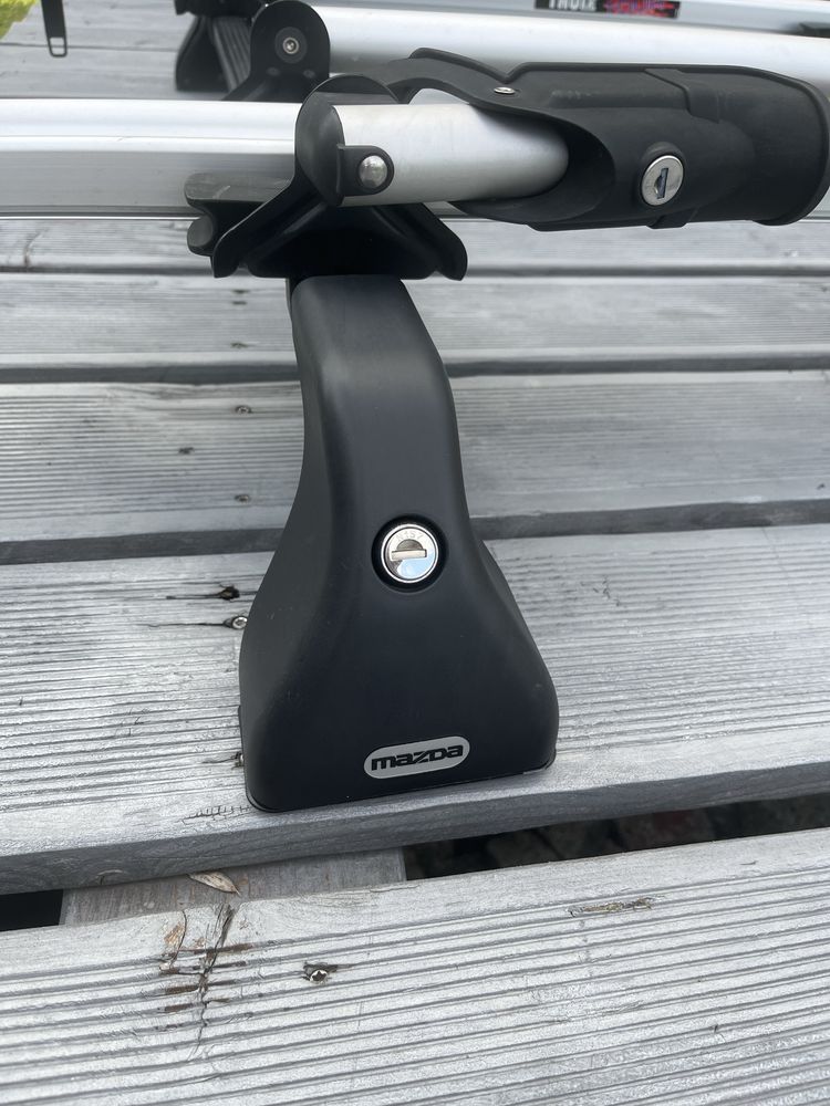 Relingi dachowe- bagaznik rowerowy Thule komplet Mazda3 II