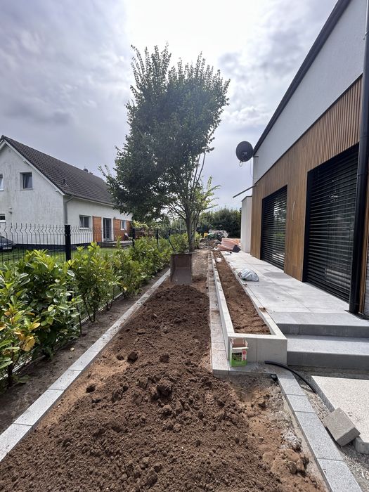 Brukarstwo Budowa ogrodów Trawniki Systemy nawadniające Prace ziemne