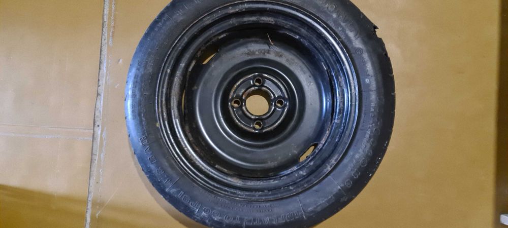 Продам запаску (докатка) 4*100 ет 54,1 Шина 125/70 R15
