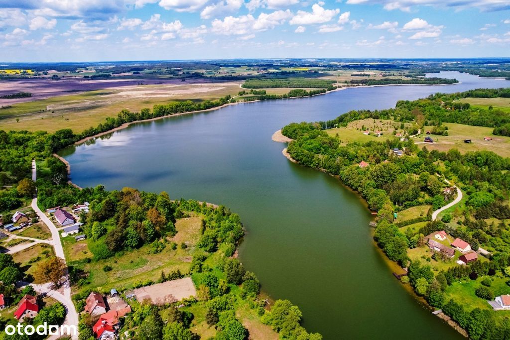 Piękne działki w otoczeniu krzewów z dostępem do jeziora Buwełno