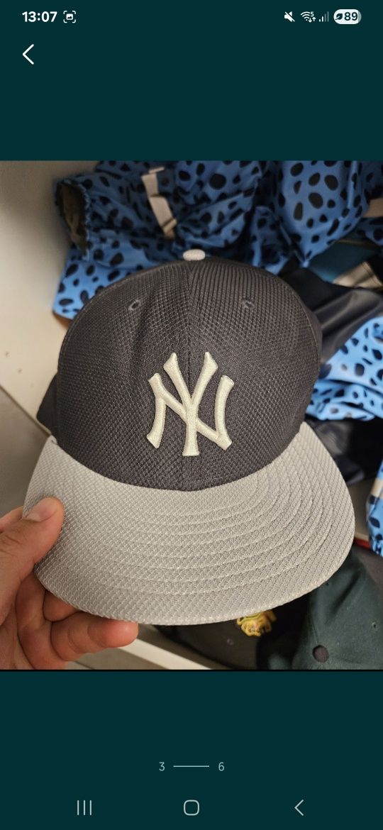 Czapki New Era..
