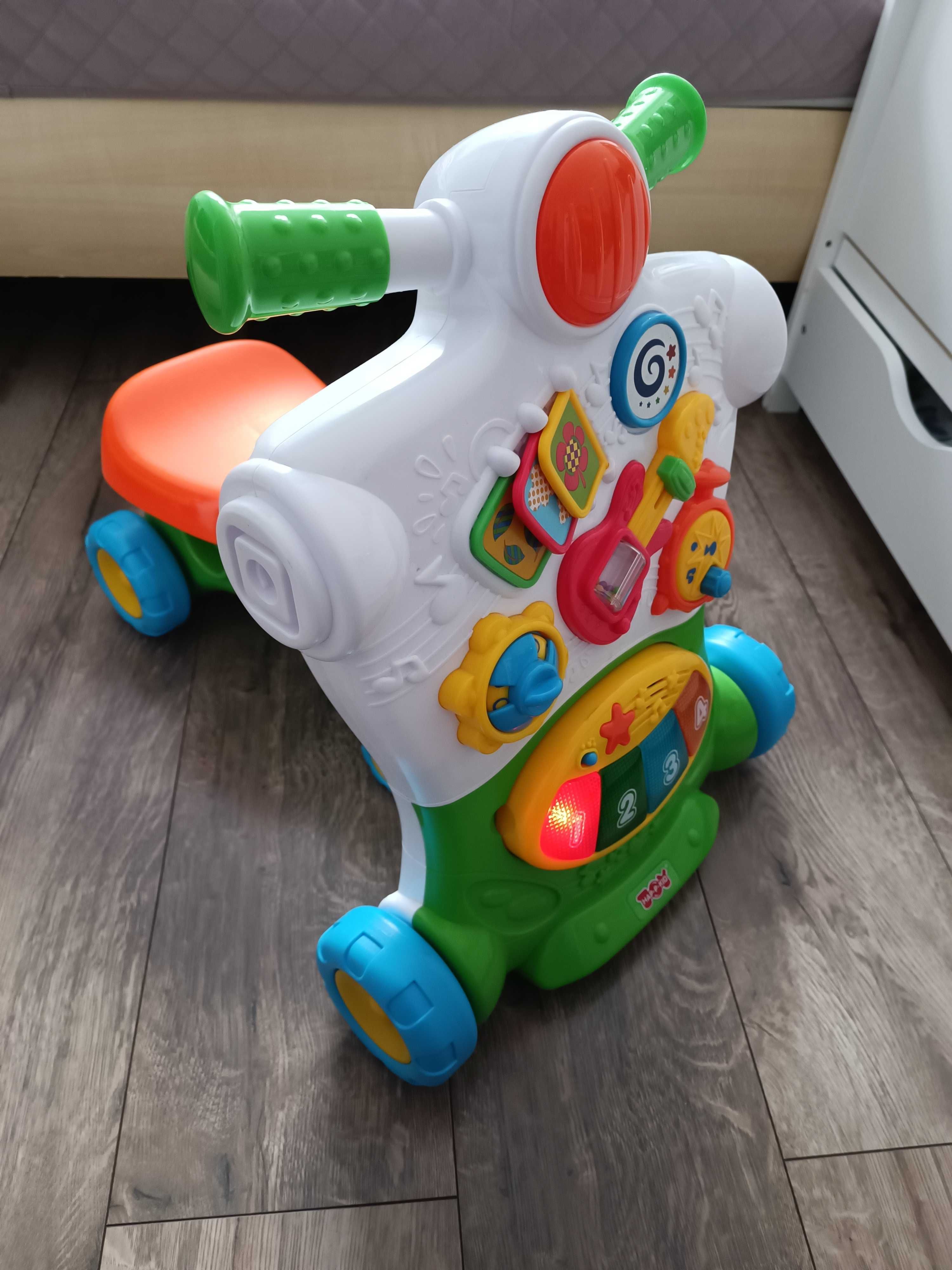 Smiki pchacz/jeździk muzyczny dla dziecka