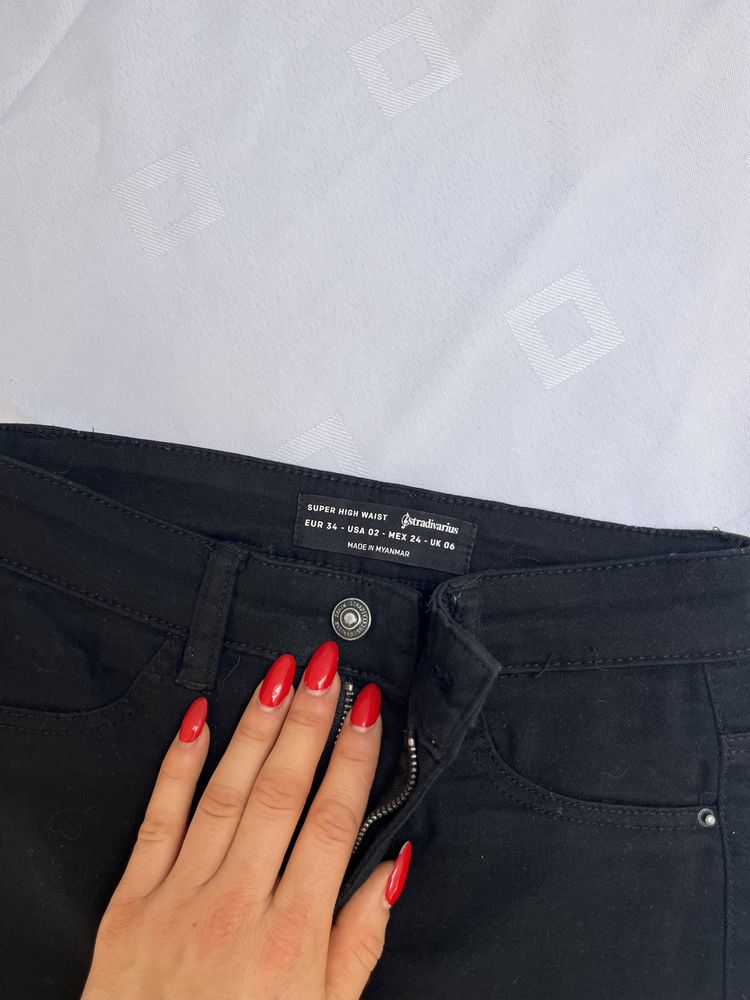 Spodnie damskie jeansy rozmiar 34 stradivarius
