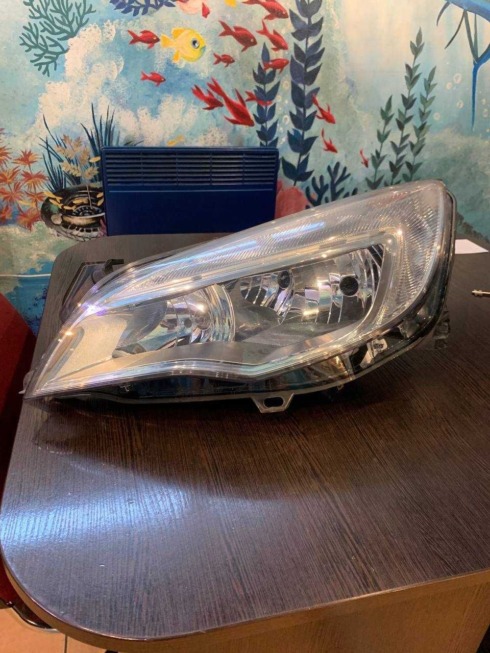 Фара левая передняя Opel astra jiv 2009-2012. 13253646